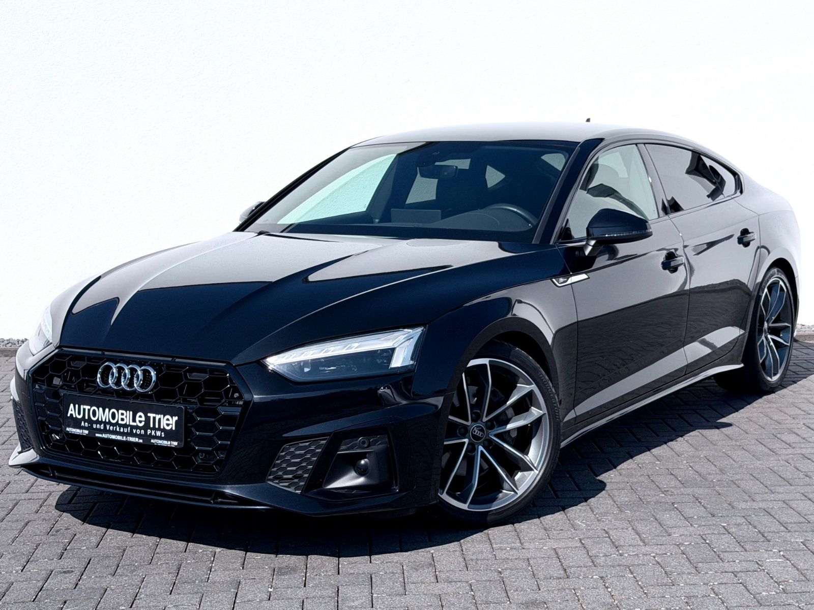 Audi A5 Sportback 40 TDI S line Sport Plus Paket - Bild 1 Audi A5 Sportback 40 TDI S line Sport Plus Paket in Schwarz als Limousine - Fahrzeugfoto 1