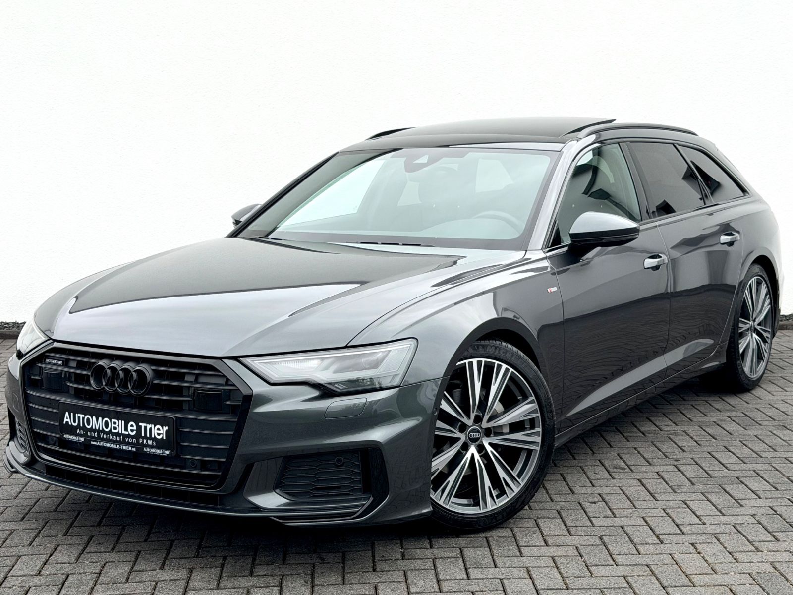 Audi A6 Avant 40 TDI quattro S line Sport Plus Paket in Grau als Kombi - Fahrzeugfoto 1