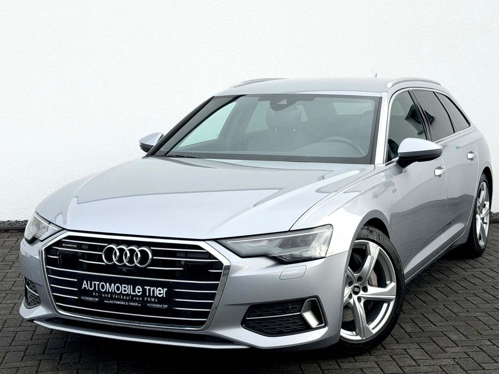 Audi A6 Avant 50 TDI quattro S line Sport Plus Paket in Silber als Kombi - Fahrzeugfoto 1