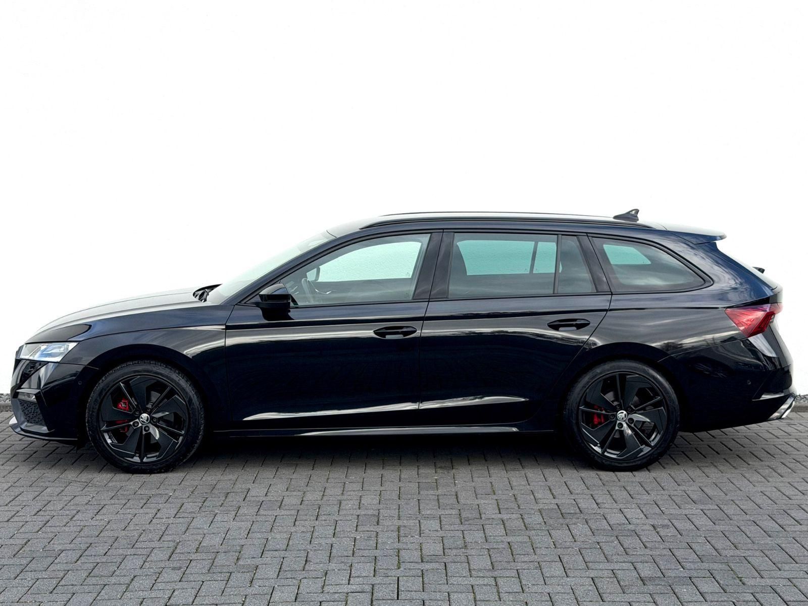 Skoda Octavia Combi RS 2.0 TDI DSG/ LED/ACC/CAM/1.HAND - Bild 8 Skoda Octavia Combi RS 2.0 TDI DSG/ LED/ACC/CAM/1.HAND in Schwarz als Kombi - Fahrzeugfoto 8