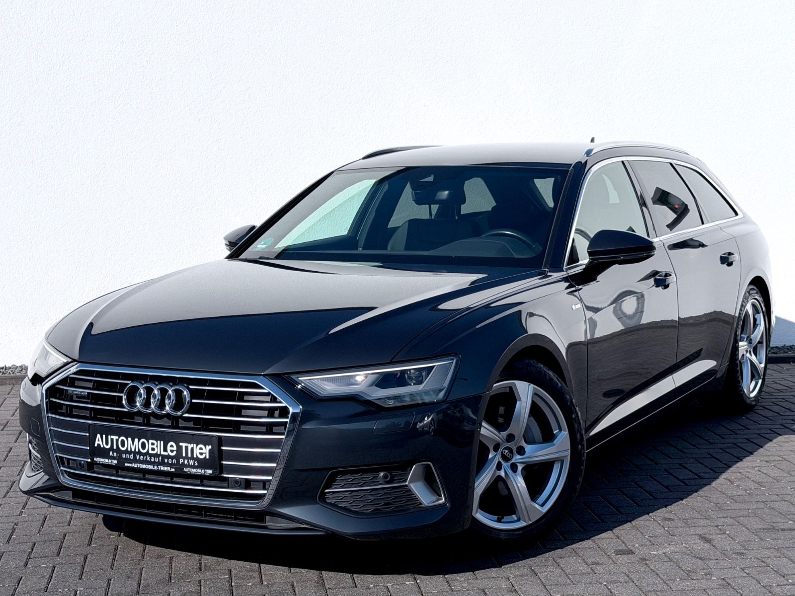 Audi A6 Avant 45 TDI quattro S line Sport Plus Paket in Grau als Kombi - Fahrzeugfoto 1