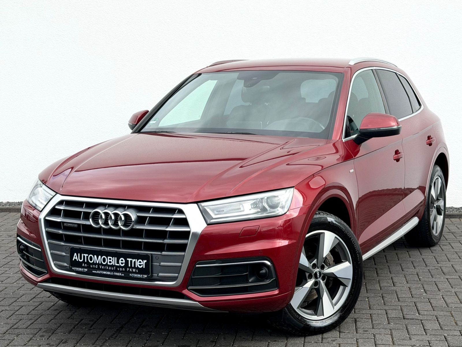 Audi Q5 40 TDI quattro S line Sport Plus Paket in Rot als SUV/Geländewagen/Pickup - Fahrzeugfoto 1