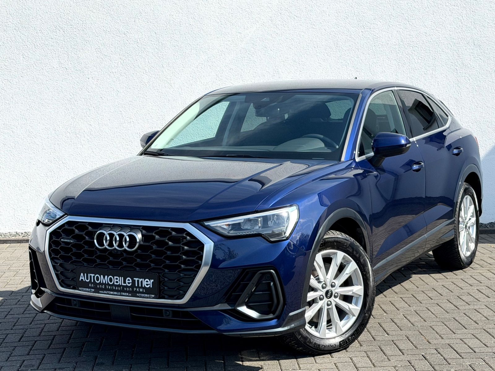 Audi Q3 Sportback 40 TFSI quattro S line /1.HAND/ in Blau als Sportwagen/Coupé - Fahrzeugfoto 1