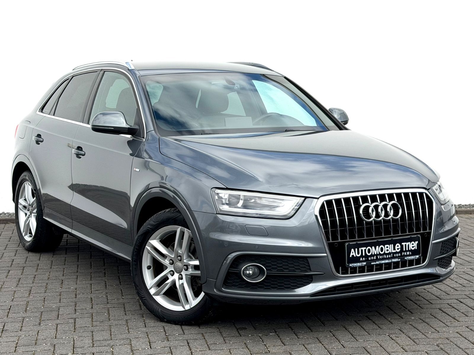 Audi Q3 2.0 TDI S line Sport Plus Paket /1.HAND/ - Bild 3 Audi Q3 2.0 TDI S line Sport Plus Paket /1.HAND/ in Monsungrau Metallic als SUV/Geländewagen/Pickup - Fahrzeugfoto 3