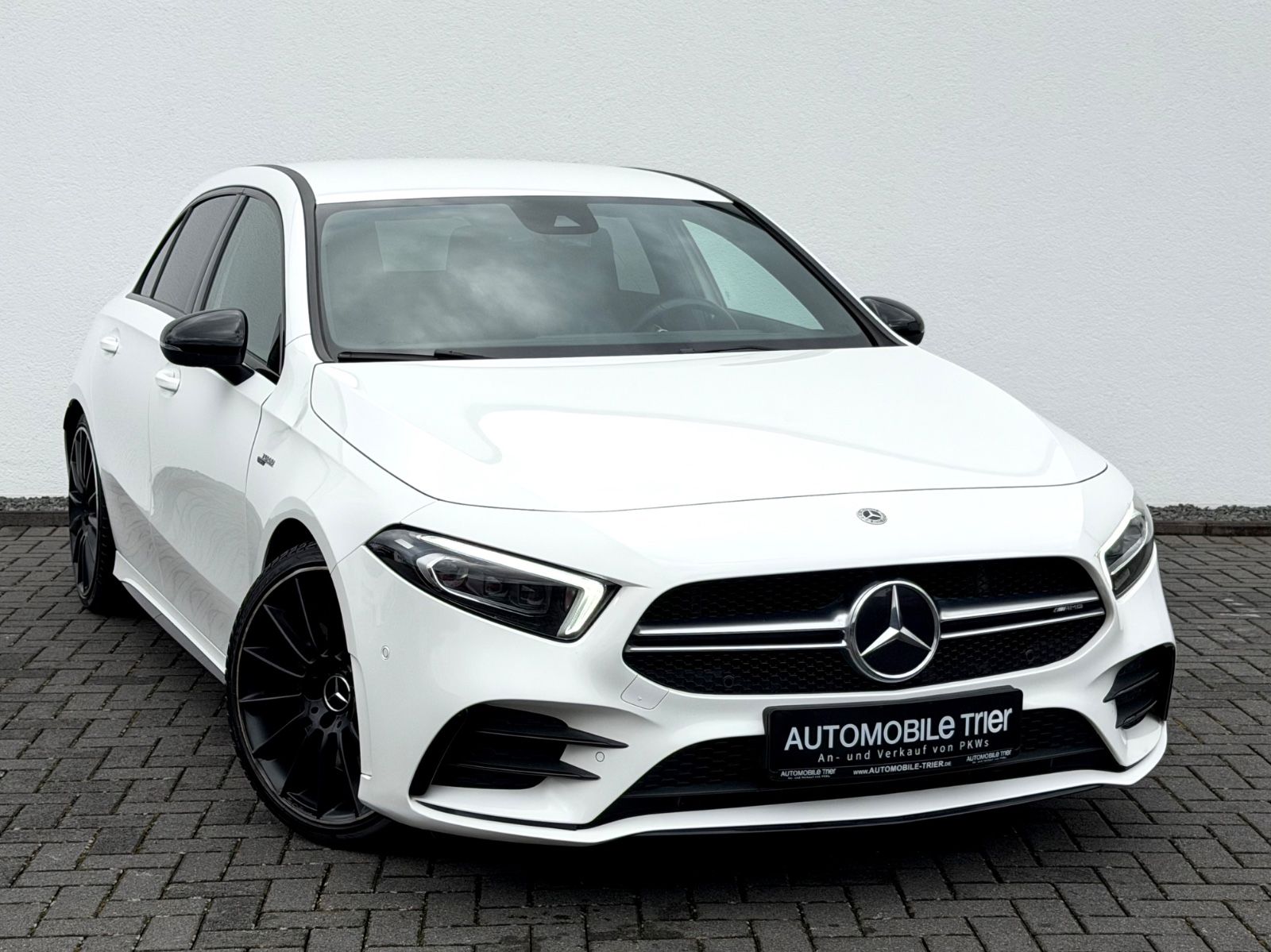 Mercedes-Benz A 35 AMG 4Matic /NAVI/LED/CAM/GARANTIE/ - Bild 3 Mercedes-Benz A 35 AMG 4Matic /NAVI/LED/CAM/GARANTIE/ in POLARWEISS - UNILACK als Sportwagen/Coupé - Fahrzeugfoto 3