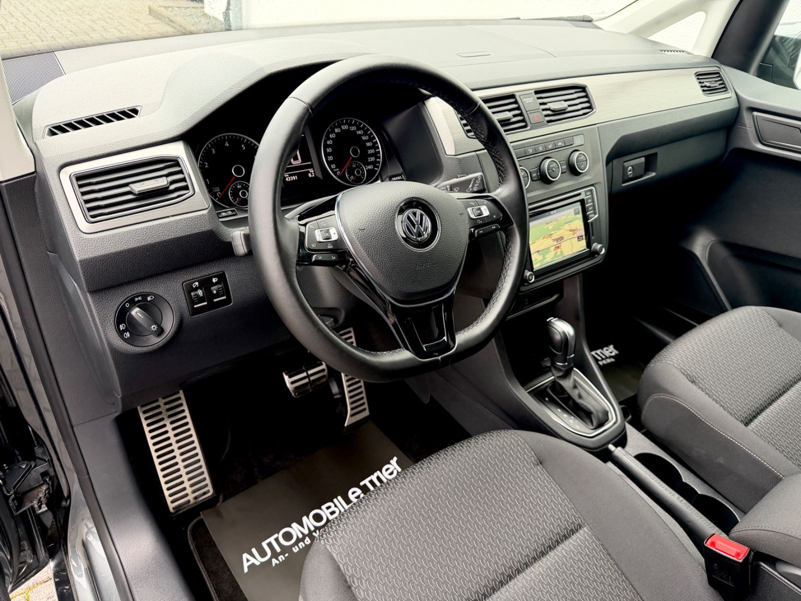 Volkswagen Caddy 1.4 TSI DSG *Navi*2xKlima*Garantie* - Bild 10 Volkswagen Caddy 1.4 TSI DSG *Navi*2xKlima*Garantie* in INDIUMGRAU als Van/Minibus - Fahrzeugfoto 10