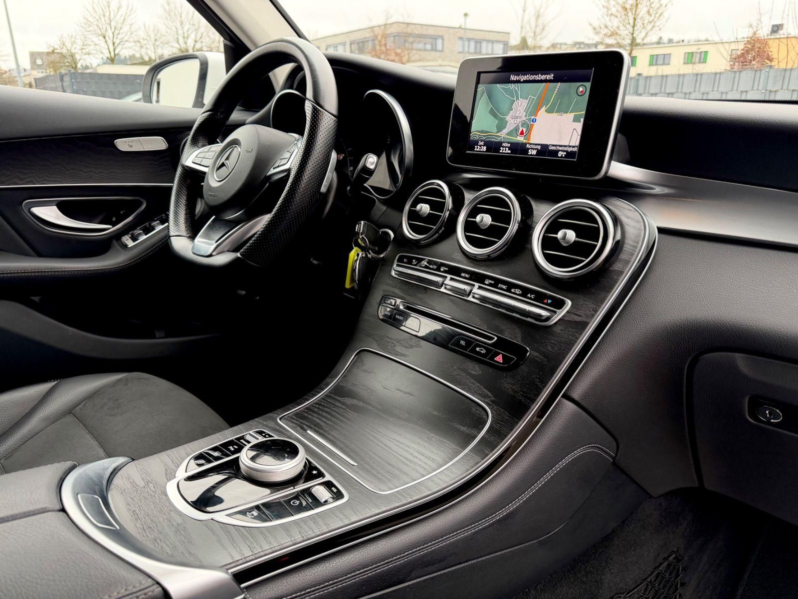Mercedes-Benz GLC 250 d 4Matic Amg Line / NAVI/LED/AHK/1.HAND/ - Bild 12 Mercedes-Benz GLC 250 d 4Matic Amg Line / NAVI/LED/AHK/1.HAND/ in POLARWEISS als SUV/Geländewagen/Pickup - Fahrzeugfoto 12