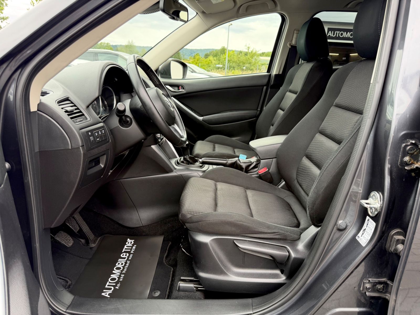 Mazda CX-5 Sendo 2.0 /KLIMA/NAVI/KAMERA/GARANTIE/ - Bild 9 Mazda CX-5 Sendo 2.0 /KLIMA/NAVI/KAMERA/GARANTIE/ in METEOR GREY als SUV/Geländewagen/Pickup - Fahrzeugfoto 9