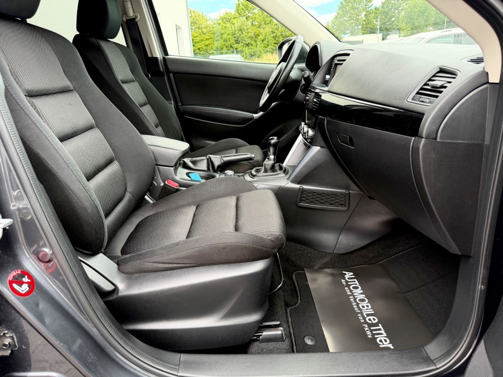 Mazda CX-5 Sendo 2.0 /KLIMA/NAVI/KAMERA/GARANTIE/ - Bild 12 Mazda CX-5 Sendo 2.0 /KLIMA/NAVI/KAMERA/GARANTIE/ in METEOR GREY als SUV/Geländewagen/Pickup - Fahrzeugfoto 12