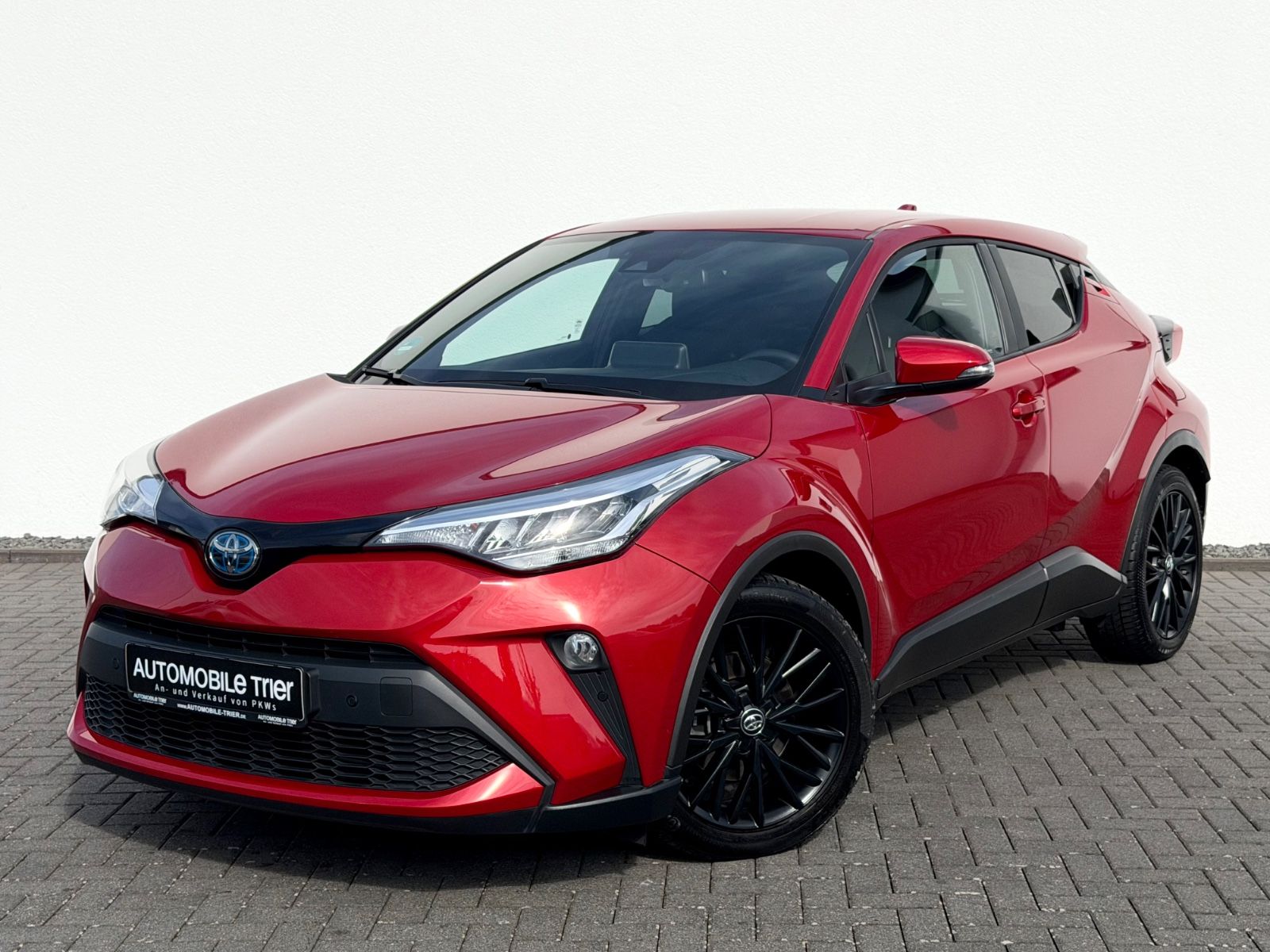 Toyota C-HR Hybrid Black Edition /ACC/CAM/AHK/GARANTIE/ - Bild 1 Toyota C-HR Hybrid Black Edition /ACC/CAM/AHK/GARANTIE/ in Rot als SUV/Geländewagen/Pickup - Fahrzeugfoto 1