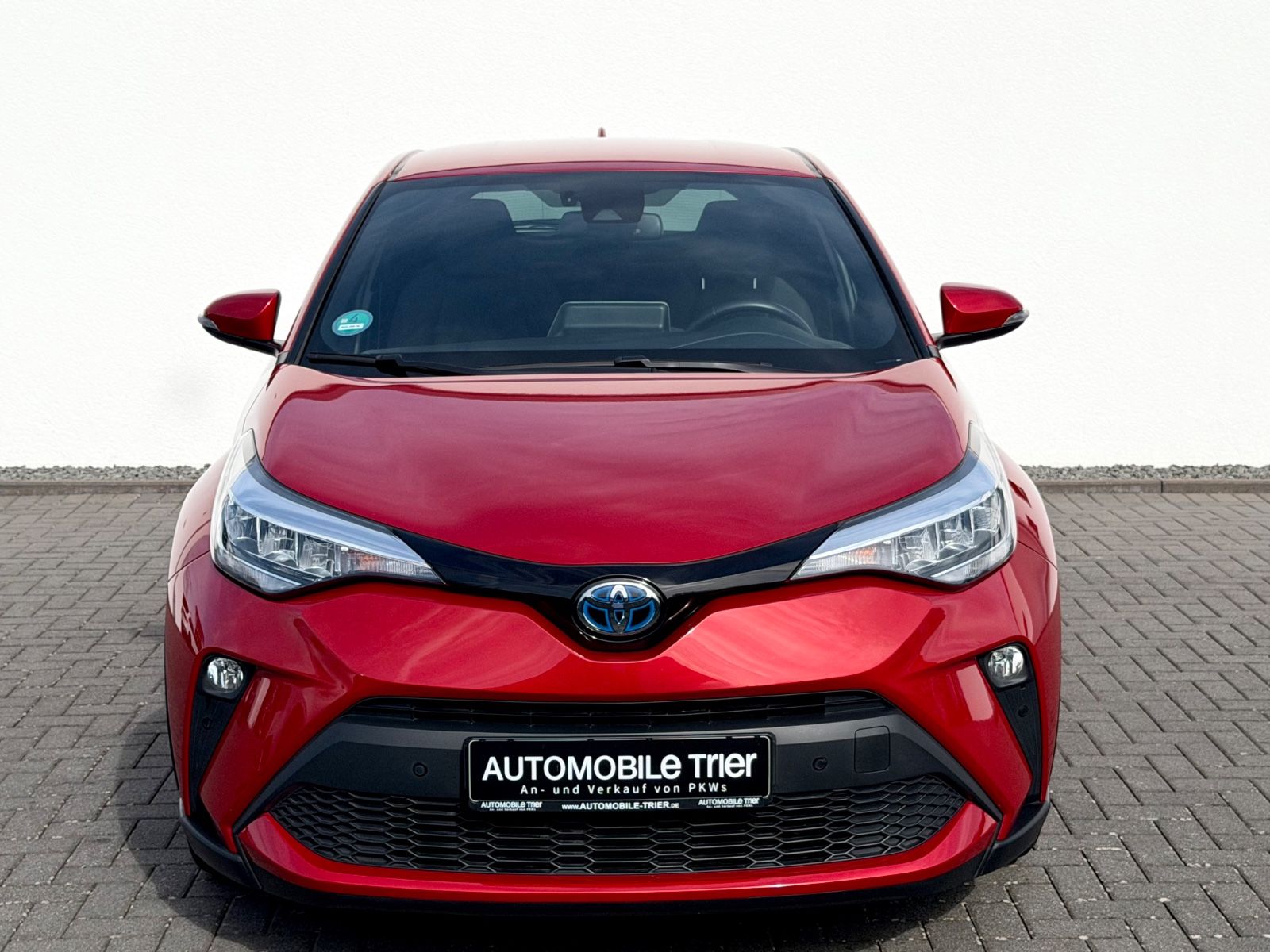 Toyota C-HR Hybrid Black Edition /ACC/CAM/AHK/GARANTIE/ - Bild 2 Toyota C-HR Hybrid Black Edition /ACC/CAM/AHK/GARANTIE/ in Rot als SUV/Geländewagen/Pickup - Fahrzeugfoto 2