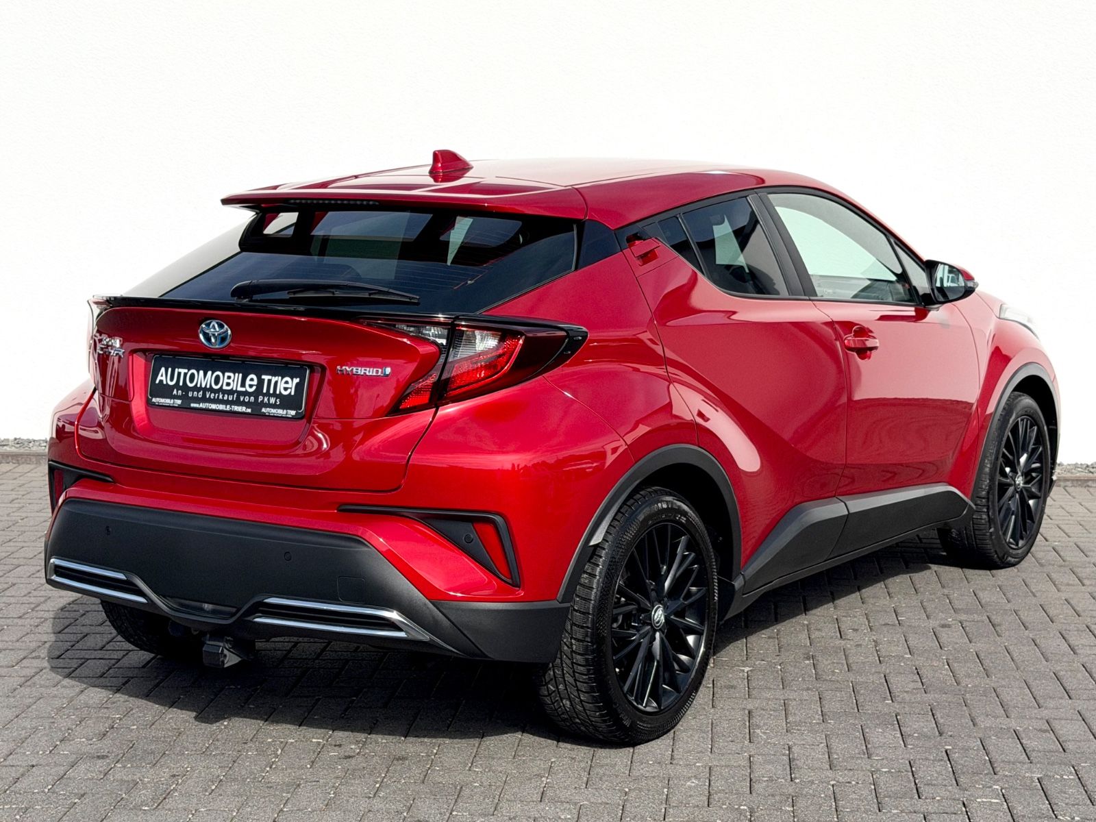 Toyota C-HR Hybrid Black Edition /ACC/CAM/AHK/GARANTIE/ - Bild 5 Toyota C-HR Hybrid Black Edition /ACC/CAM/AHK/GARANTIE/ in Rot als SUV/Geländewagen/Pickup - Fahrzeugfoto 5