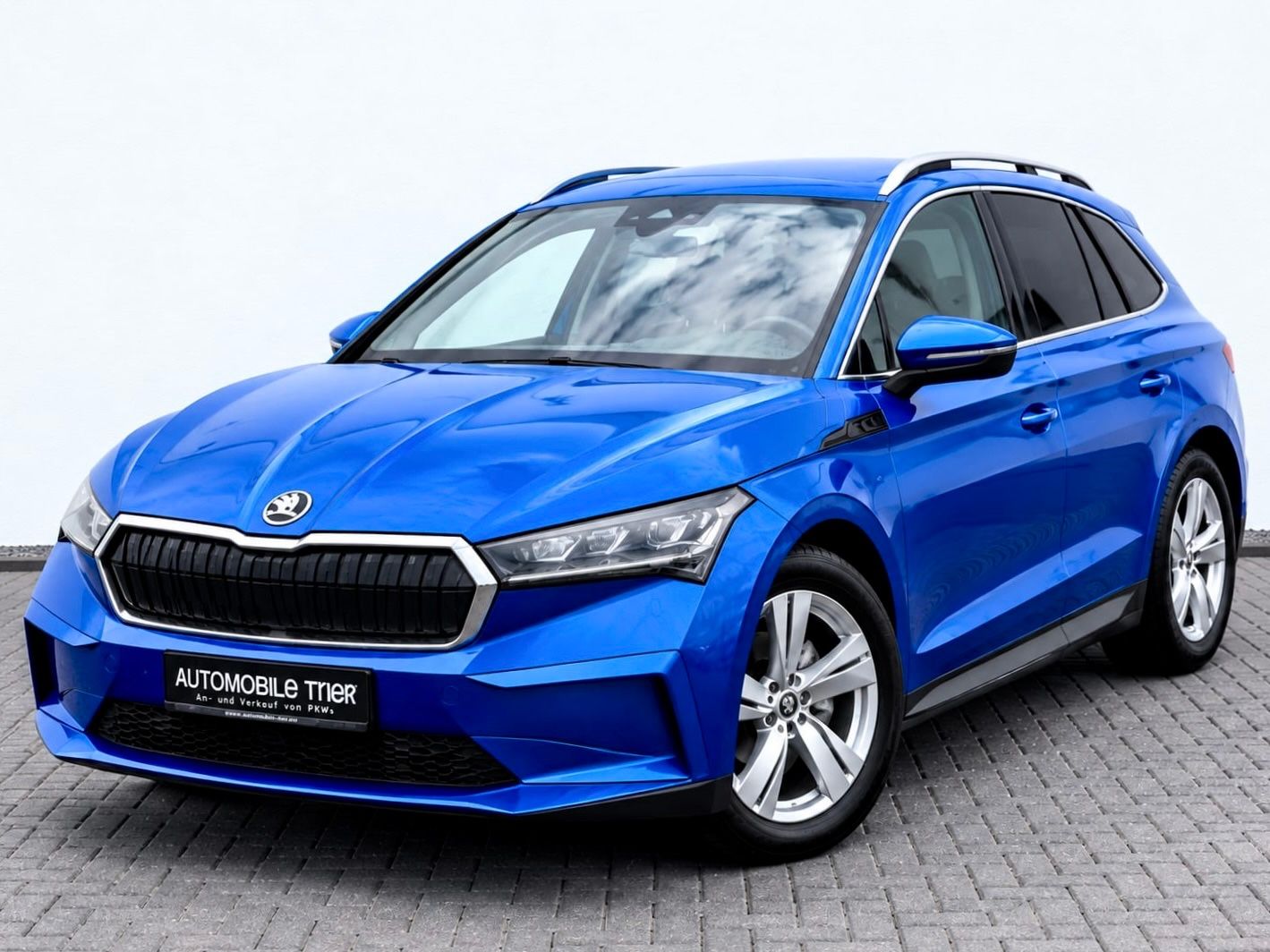 Skoda Enyaq iV 80 Loft NAVI/LED/ACC/CAM/CARPLAY/1.HAND in Race-Blau Metallic als SUV/Geländewagen/Pickup - Fahrzeugfoto 1